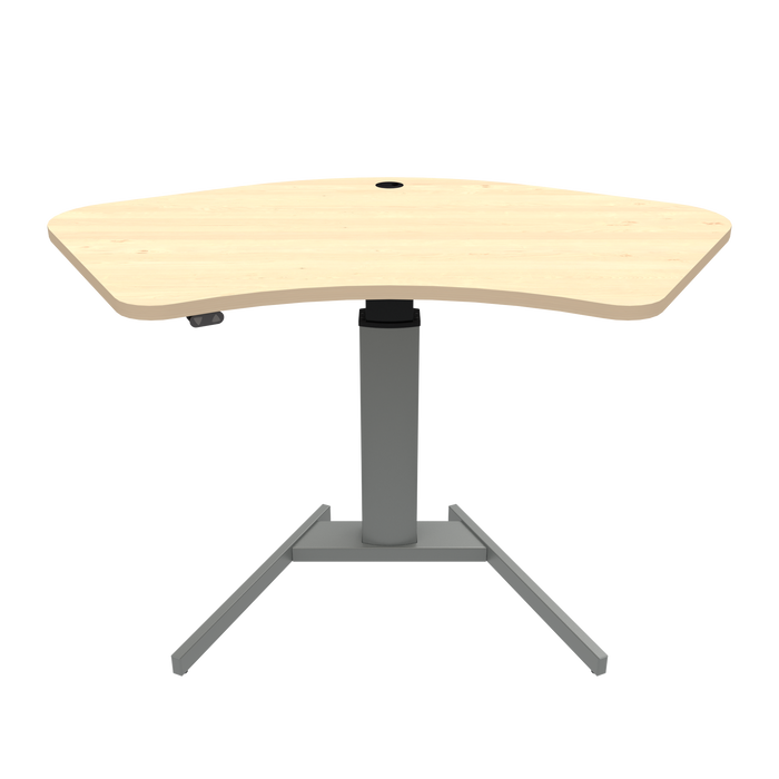 ConSet brand stand-up desk featuring a maple wood finish tabletop with an ergonomic curve design, supported by a single, sturdy silver steel column and a T-shaped base.